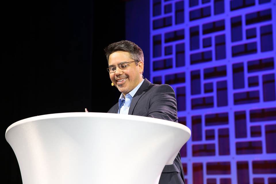Chris &ldquo;Shmiddy&rdquo; Schmidt speaking on stage