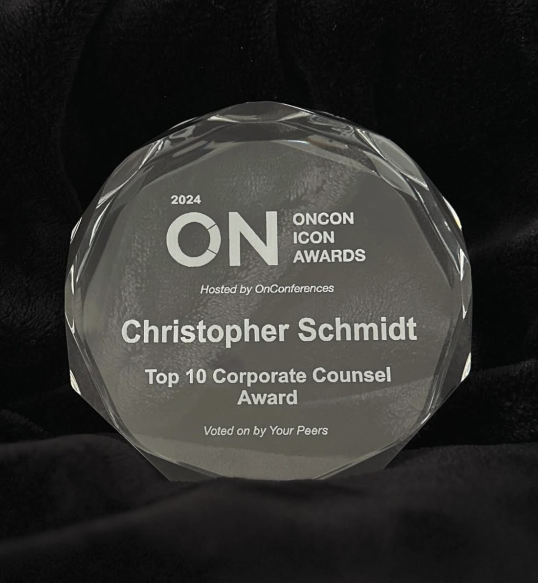 The 2024 OnCon Icon Awards Top 10 Corporate Counsel award engraved to Christopher Schmidt